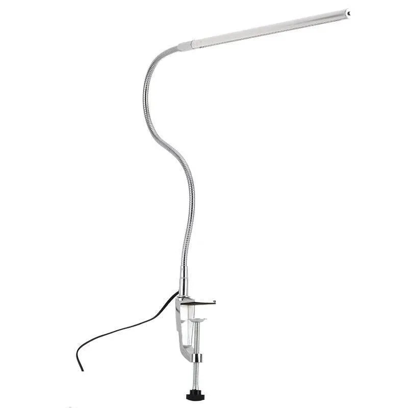 Silver aluminium alloy LED nail lighting table lamp with long arm and clip mounting for beauty workstations