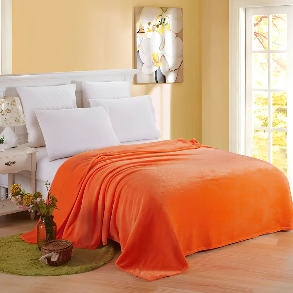 Coral fleece flannel blanket in beige showing textured surface and consistent edges