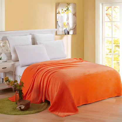 Coral fleece flannel blanket in beige showing textured surface and consistent edges