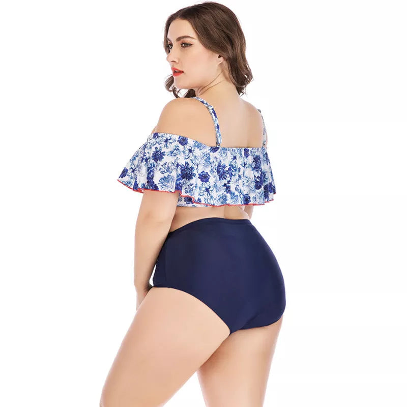 Women's printed plus size swimsuit in vibrant design, sizes XL to 4XL