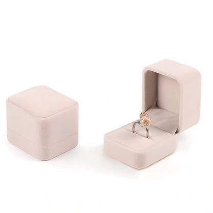 Flannel-lined jewellery box measuring 5x5x4.5cm in beige colour with MDF construction