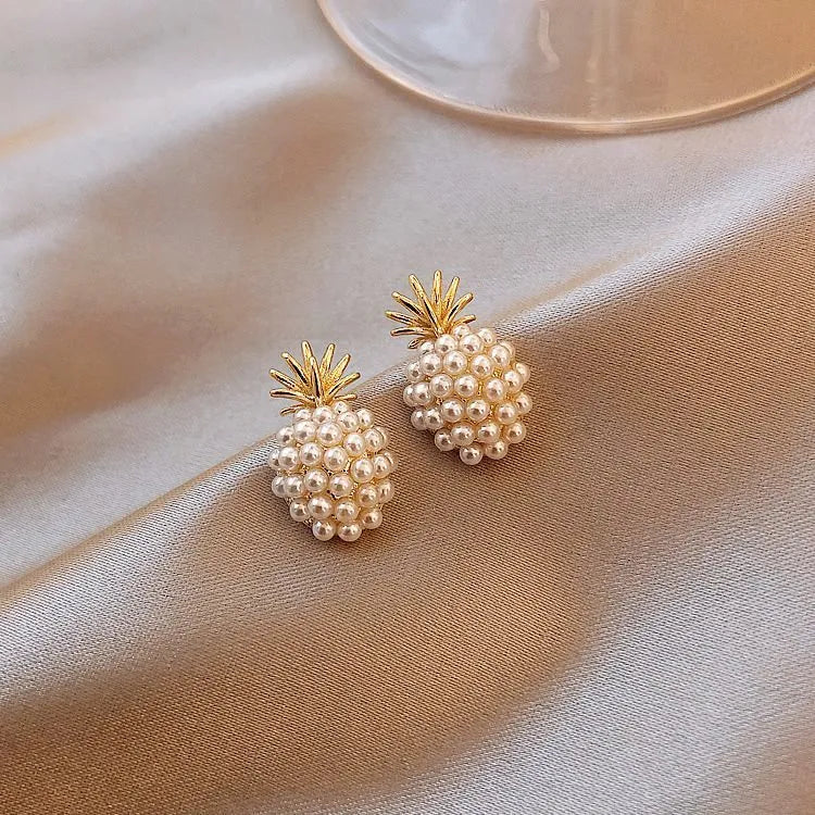Korean-style women's pineapple starfish pearl alloy earrings with gemstone details in gold, pearl flower, silver, and starfish pearl colours.