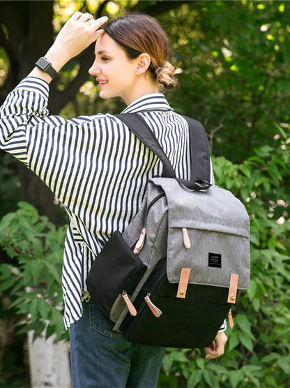 LAND Mommy large grey diaper backpack with changing mat, shown as a travel nappy bag.