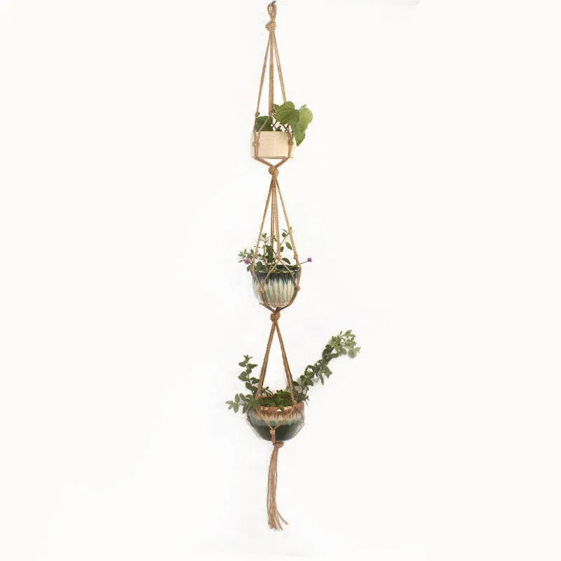 Woven wire lattice plant holder with natural cotton rope, shown in a rustic style supporting a green plant.