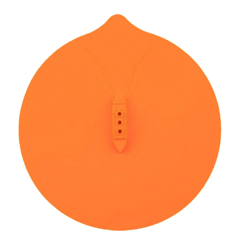 Blue silicone steamer lid measuring 26x25cm on kitchen bowl creating airtight seal for cooking