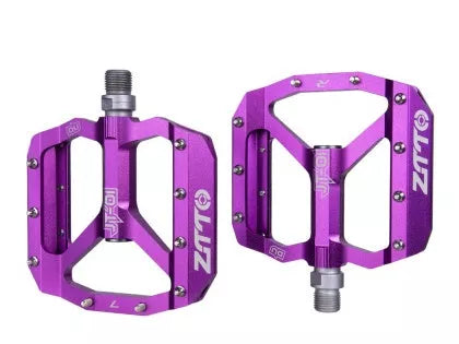 Aluminum alloy bicycle pedal with chrome molybdenum steel shaft in black, red, silver, and purple