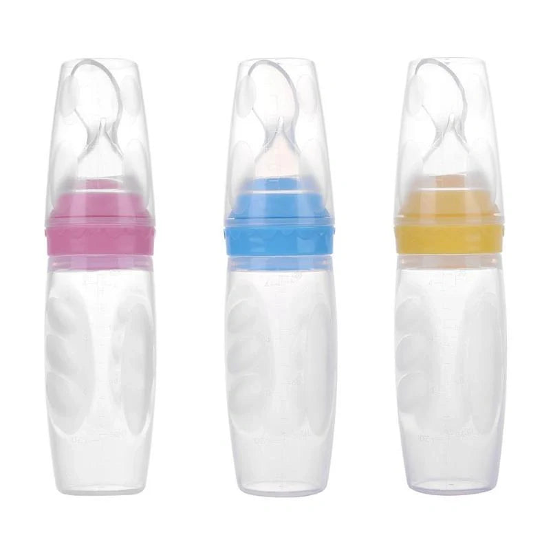 Blue silicone baby feeding spoon with squeeze mechanism, 19.5cm length