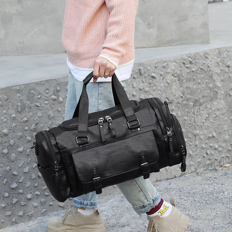 Black travel bag with shoe compartment showing 52cm height, 19cm width, and 27cm depth dimensions