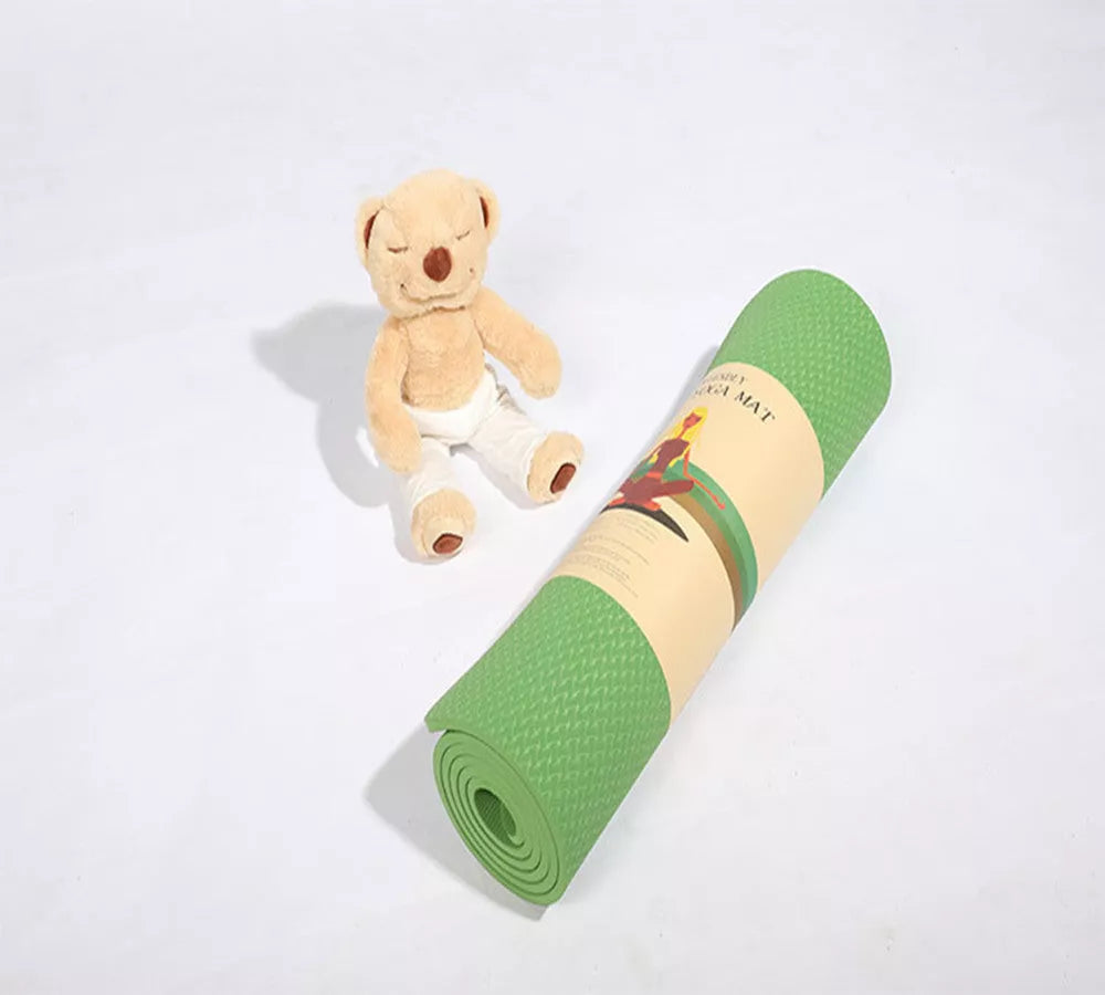 Firebird Beginner Yoga Mat in violet, blue, green, pink, or purple with 10mm thickness and non-slip surface