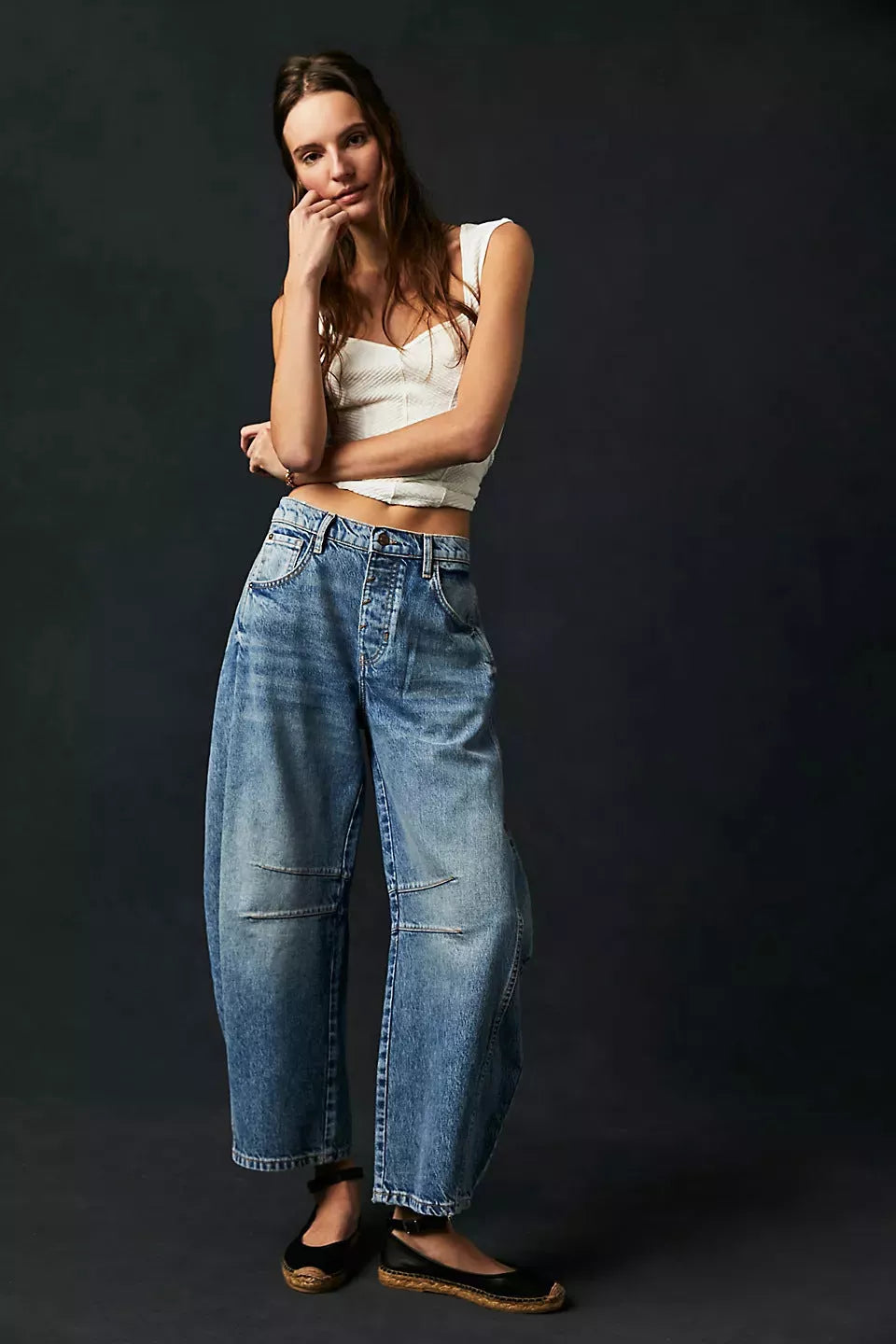 Women's mid-rise barrel jeans with wide leg design in various colors