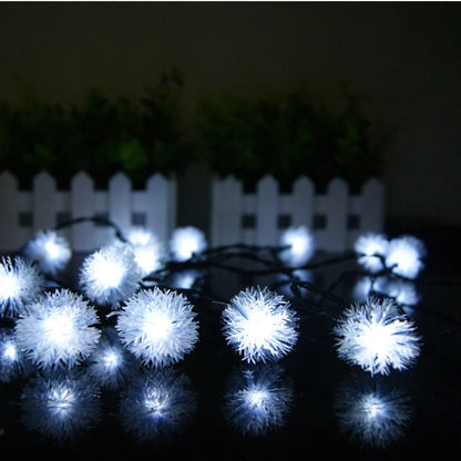 20 LED solar string lights with colourful bulbs along 5m dark green wire, solar panel, and remote control