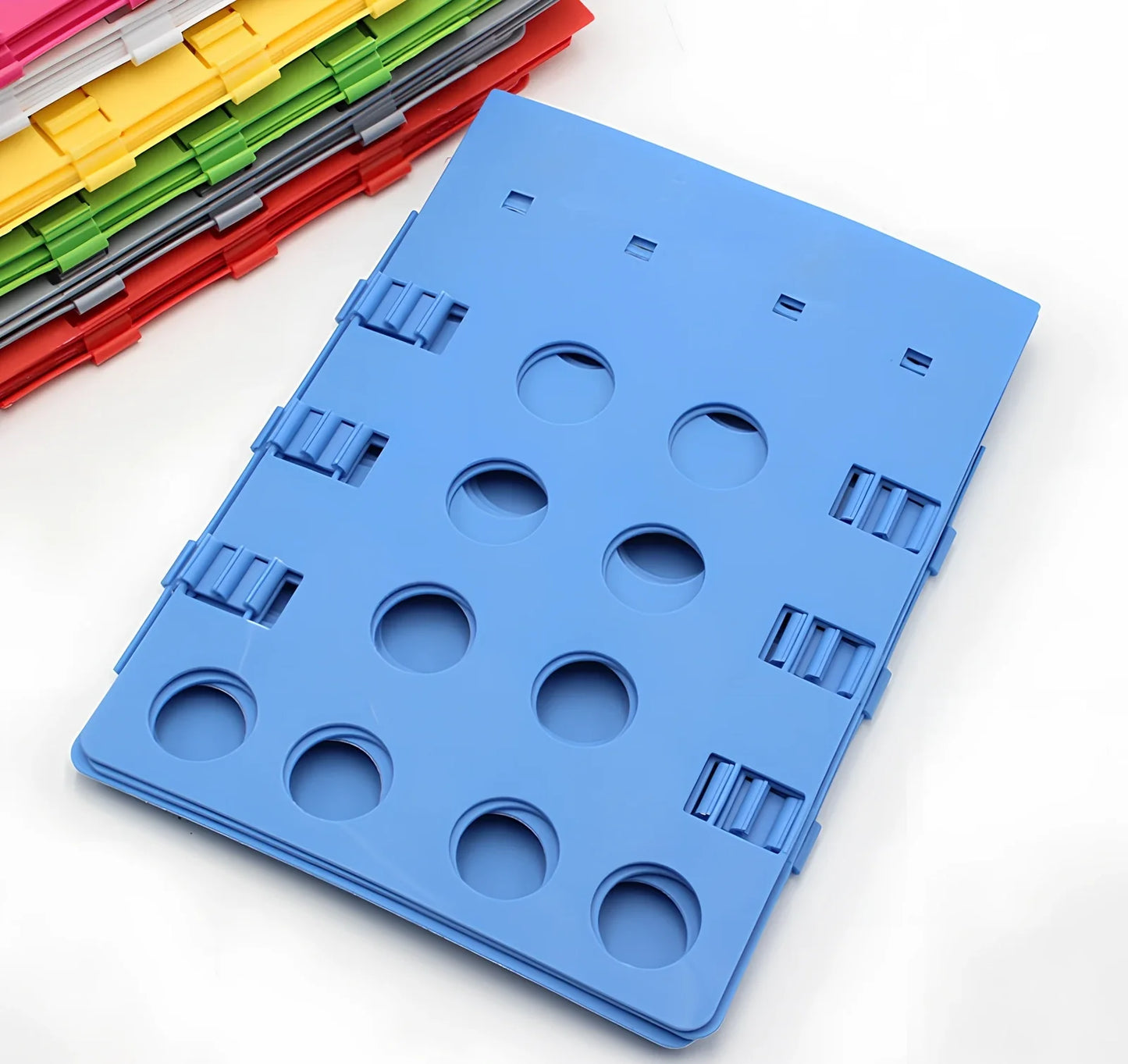 Adjustable clothes folding board showing 40x48cm and 68x57cm sizes with PP+PE construction