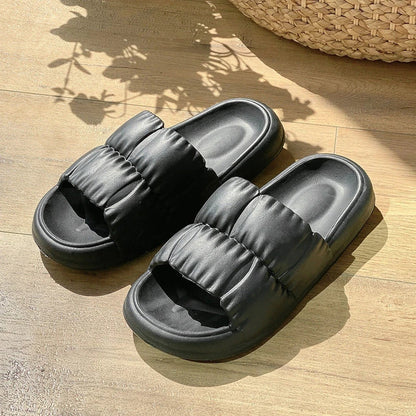 Comfortable and stylish women's bathroom slides in various vibrant colors and patterns