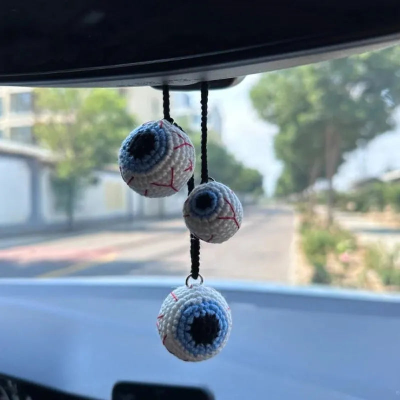 Soft, hand-woven plush car hanging ornament in a cartoon character design.