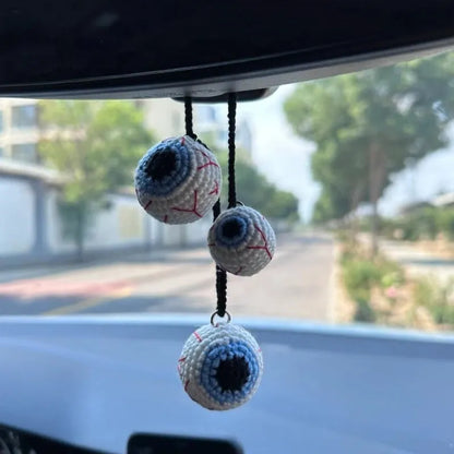 Soft, hand-woven plush car hanging ornament in a cartoon character design.