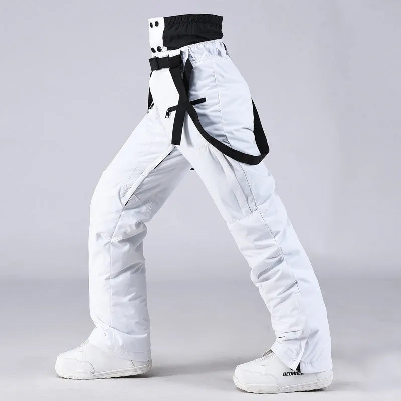 Man wearing a grey drop shoulder long sleeve t-shirt, showing relaxed fit and ribbed crew neck.