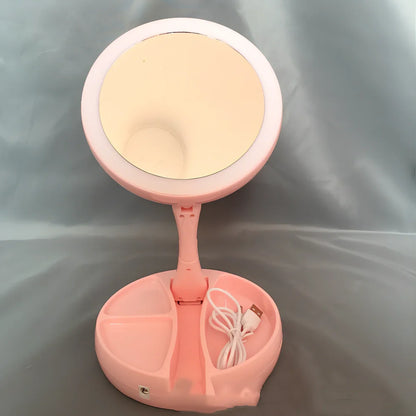 White folding LED makeup mirror showing dual magnification sides and compact storage design