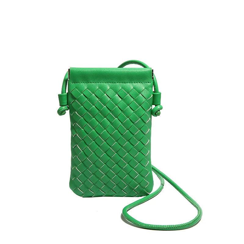 Vertical square vintage weave crossbody bag in multiple colours showing internal dark cell phone pocket.