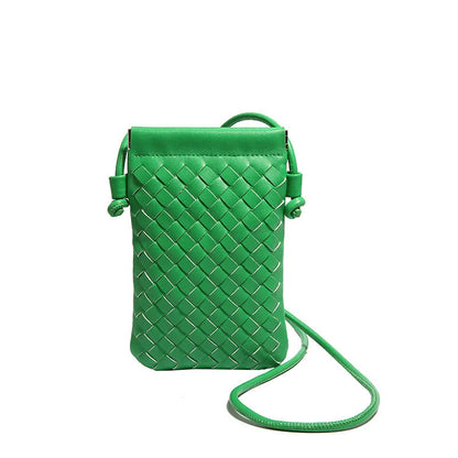 Vertical square vintage weave crossbody bag in multiple colours showing internal dark cell phone pocket.