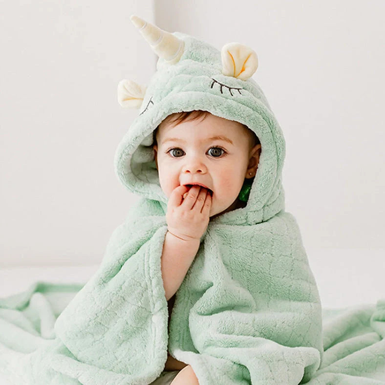 Coral fleece bath towel with animal design measuring 125cm by 80cm showing plush texture