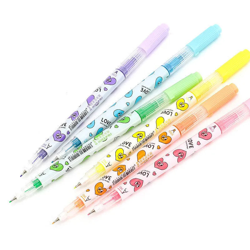 Six double-headed watercolour highlighter pens in assorted colours showing plug-in design.