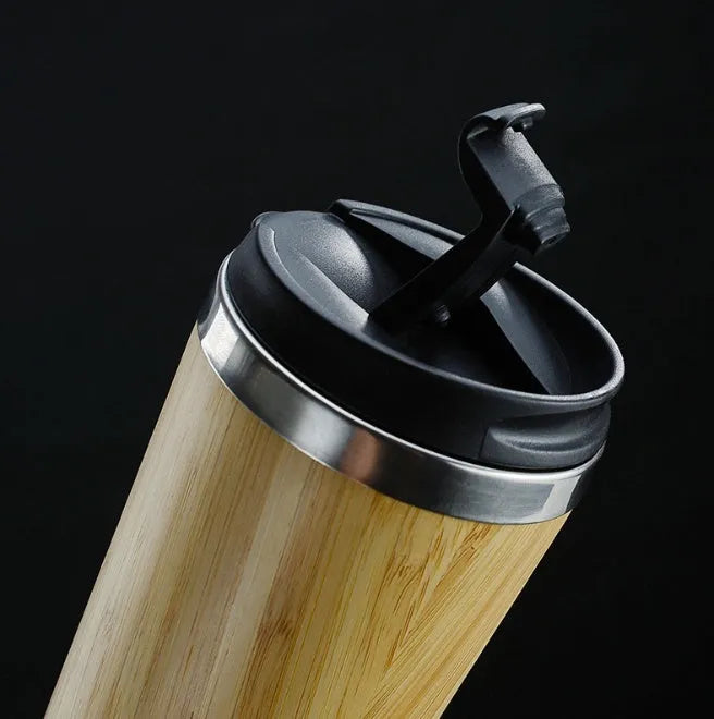 Natural bamboo coffee cup with double wall insulation, 420ml capacity, leak-proof lid and non-slip foam pad base
