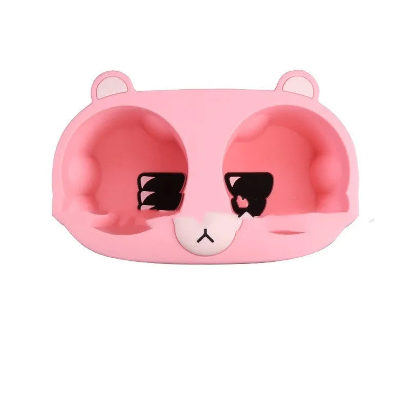 Flexible grey silicone car cup holder insert with a raised cartoon animal design for the centre console.