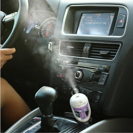 Compact car humidifier with 180-degree rotation for even air moisture, available in multiple colors