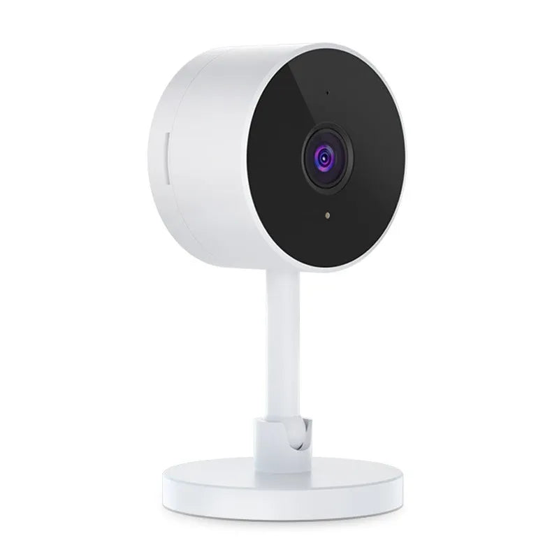 White gun-shaped Flash Fish WiFi home security camera on a table.