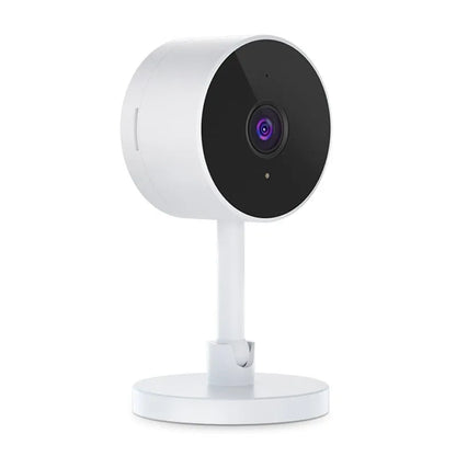 White gun-shaped Flash Fish WiFi home security camera on a table.