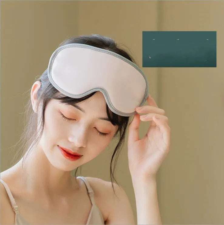 Portable eye SPA mask in pink or green with steam heating and vibration modes for relaxation