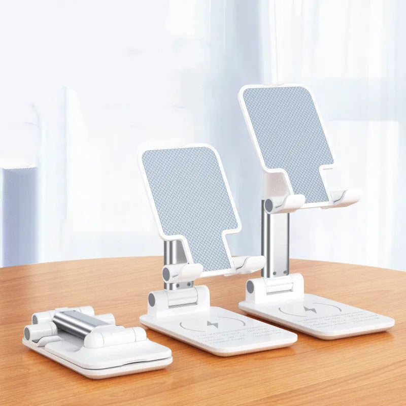 Black desktop wireless charging stand holding mobile phone at angle with power cord connected