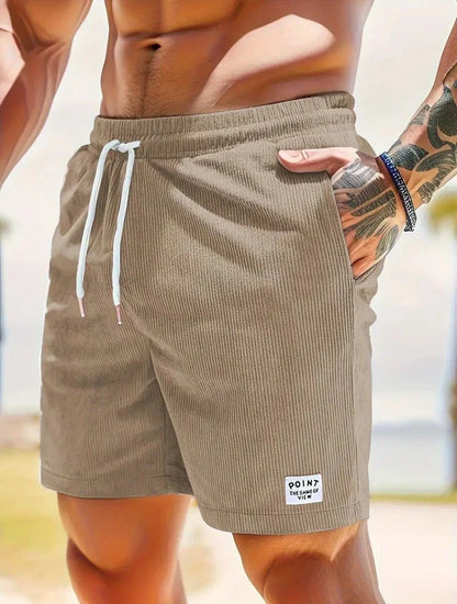 Comfortable corduroy drawstring shorts in a variety of stylish colors, perfect for casual summer wear.