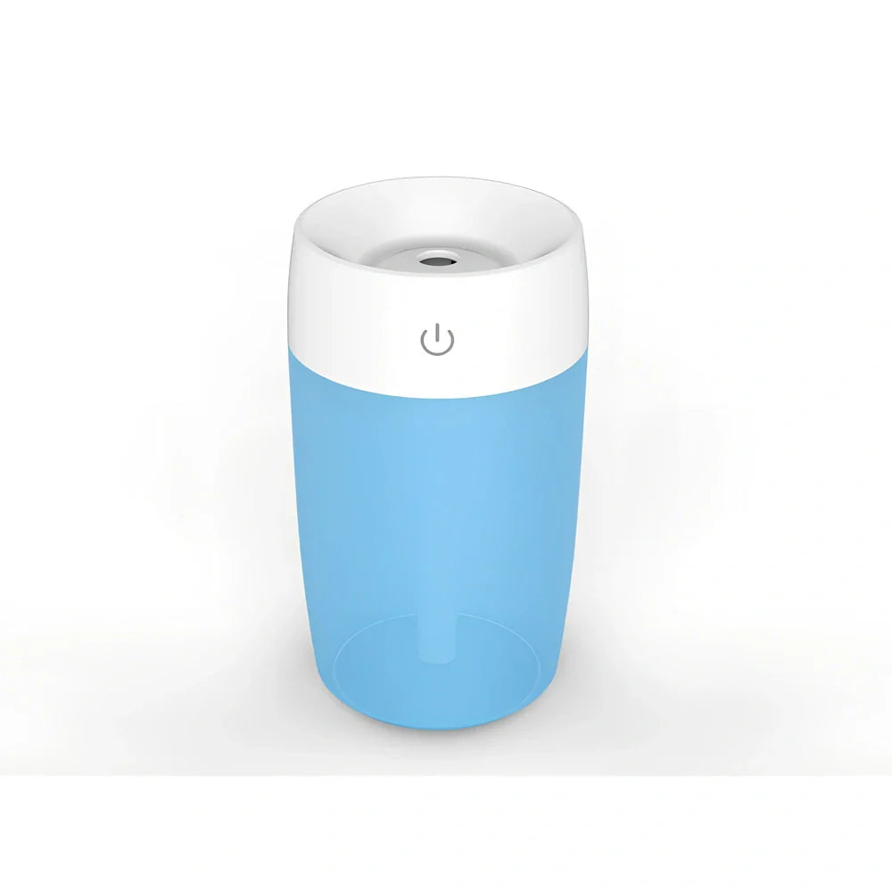 Mini air humidifier in white colour with USB cable, showing compact size suitable for desk use