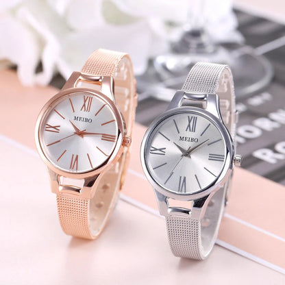 Elegant rose gold women's watch with stainless steel mesh band