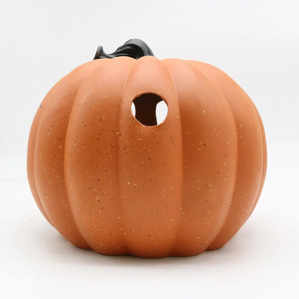 Halloween pumpkin lantern with hollow-out skull design measuring 23 by 19 centimetres