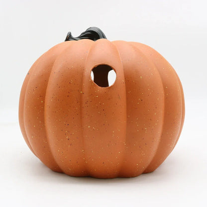 Halloween pumpkin lantern with hollow-out skull design measuring 23 by 19 centimetres