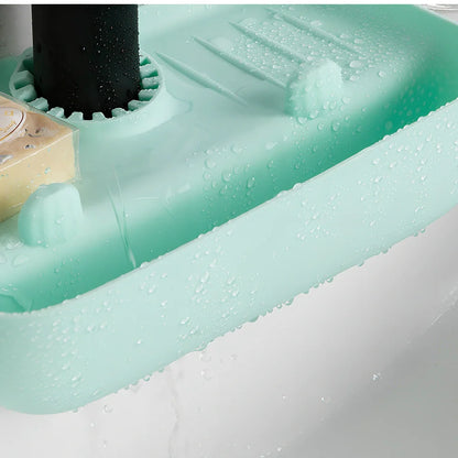 TPE kitchen drain rack with irregular shape measuring 27x14x5cm in orange colour