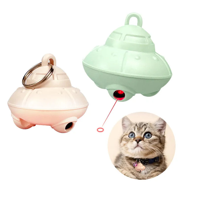 Green automatic cat laser toy unit attached to a black cat collar.
