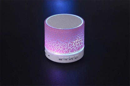 Compact, wireless Bluetooth speakers in various colors with high-quality audio components and intuitive controls