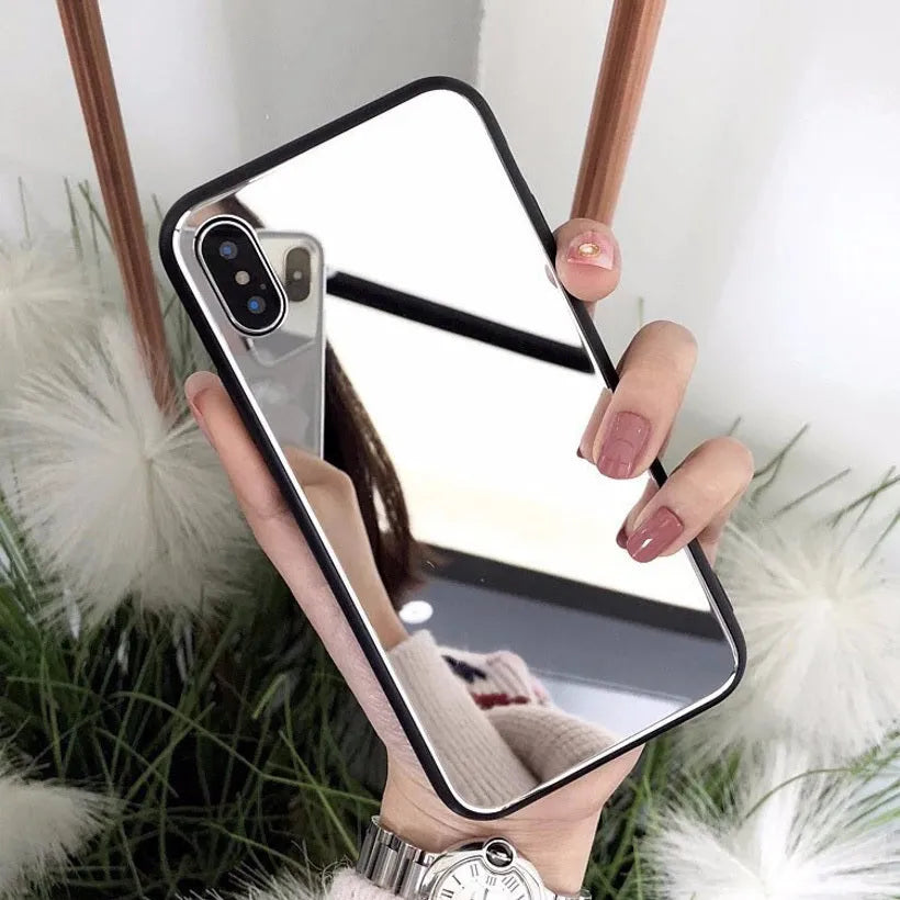 Black iPhone mirror phone case with built-in self-timer glass, compatible with iPhone 7 Plus, 8 Plus, and X models.
