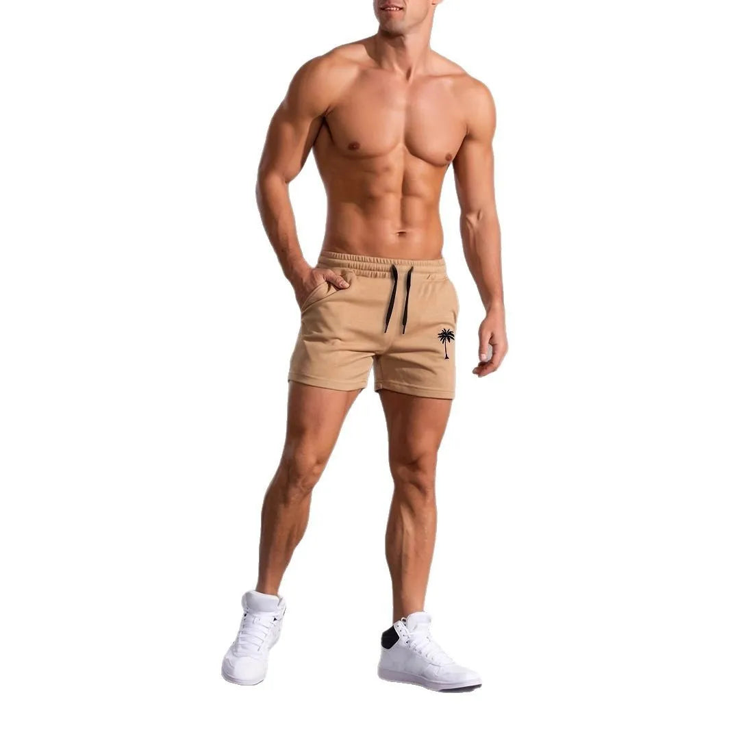 Khaki coconut print men's sports shorts with elastic waistband and straight leg design