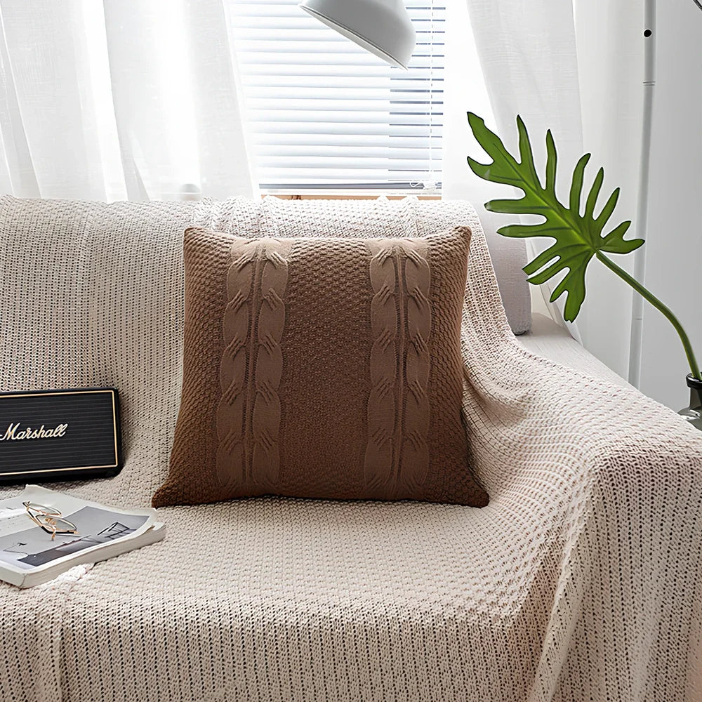Handmade Nordic wool knit pillowcase with fringe edges measuring 45x45cm in light coffee colour