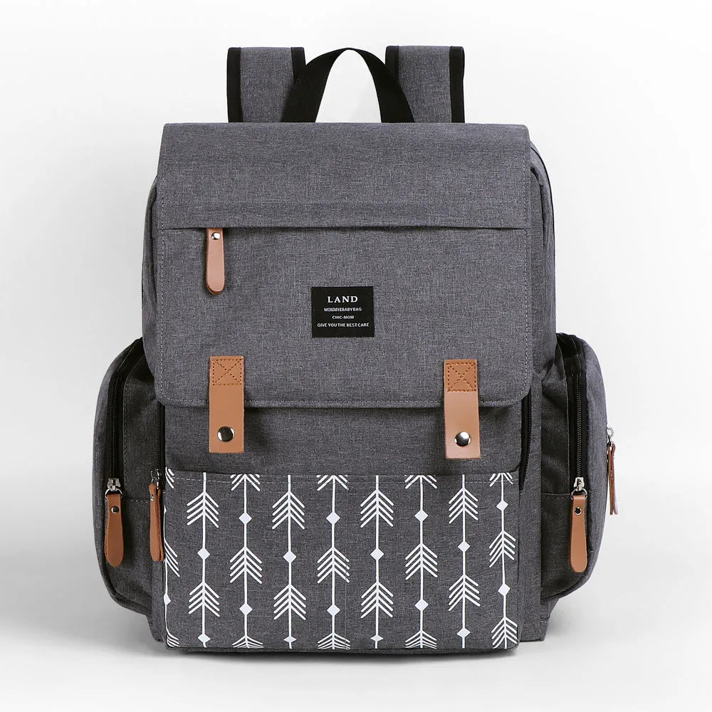 LAND Mommy large grey diaper backpack with changing mat, shown as a travel nappy bag.
