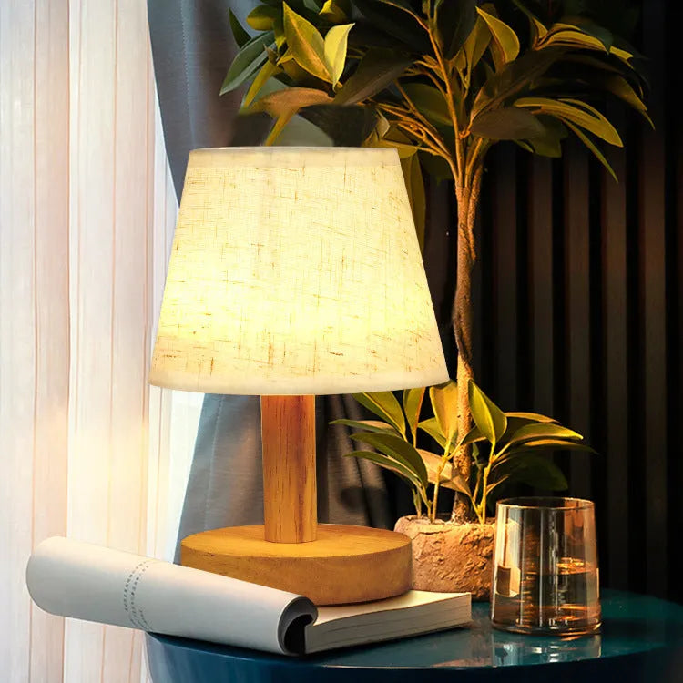 Vintage pleated table lamp with bamboo holder and jute shade, offering three-colour dimming and USB charging for ambient lighting