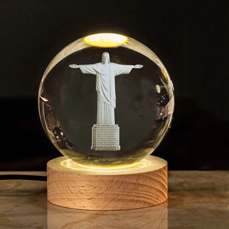 White crystal ball ornament with solid wood warm light base, showing purity engravings like Cross and Maria for desk decor