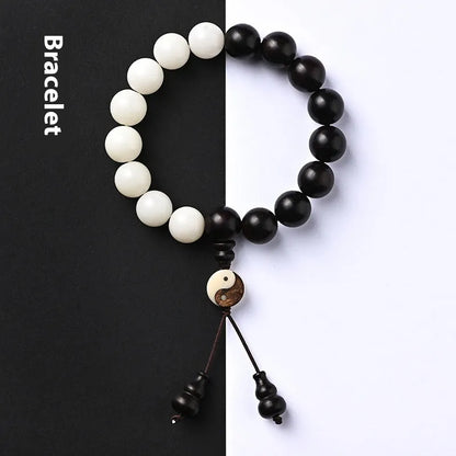 Handmade bodhi seed bracelet with eight-diagram pattern in white and blackwood beads