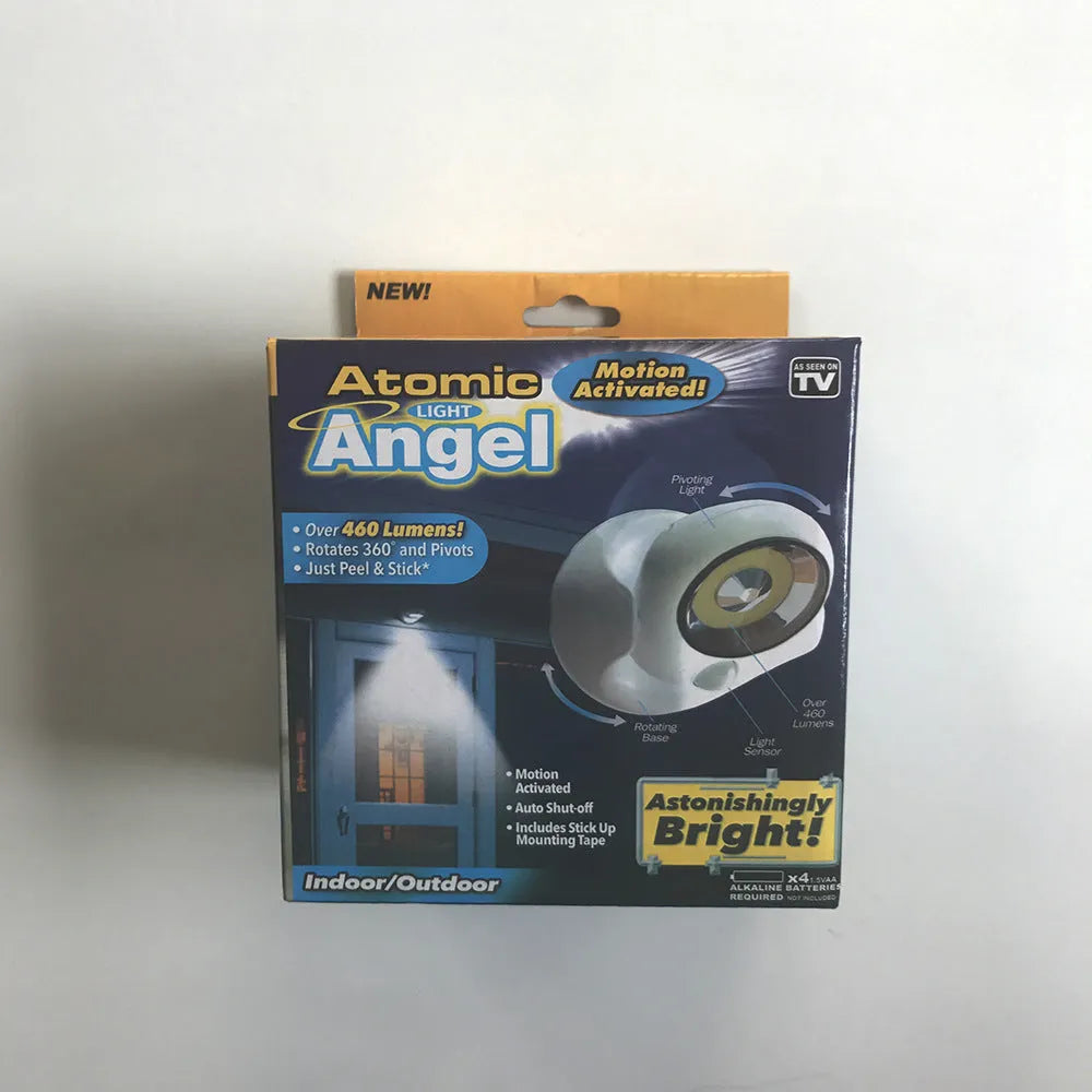 White Atomic Angel touch-control induction night light showing compact design