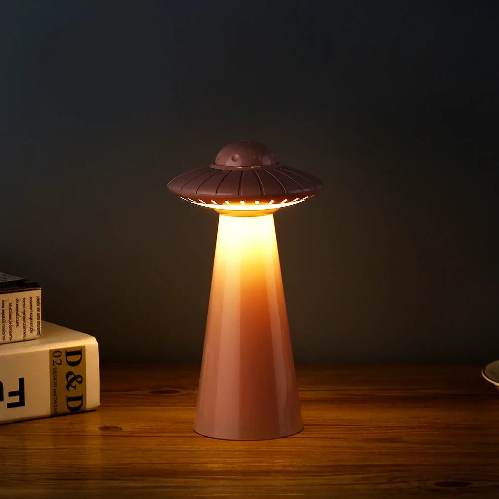 White UFO-shaped desk lamp with USB charging port and push-button switch
