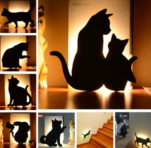 Assorted animal-shaped night lights with motion sensor, including a walking cat, mother and child cat, licking cat, looking back cat, and Pikachu